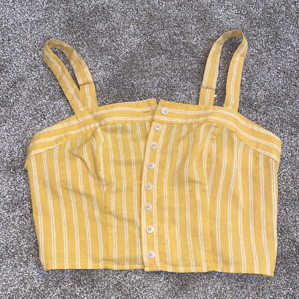 yellow button up top